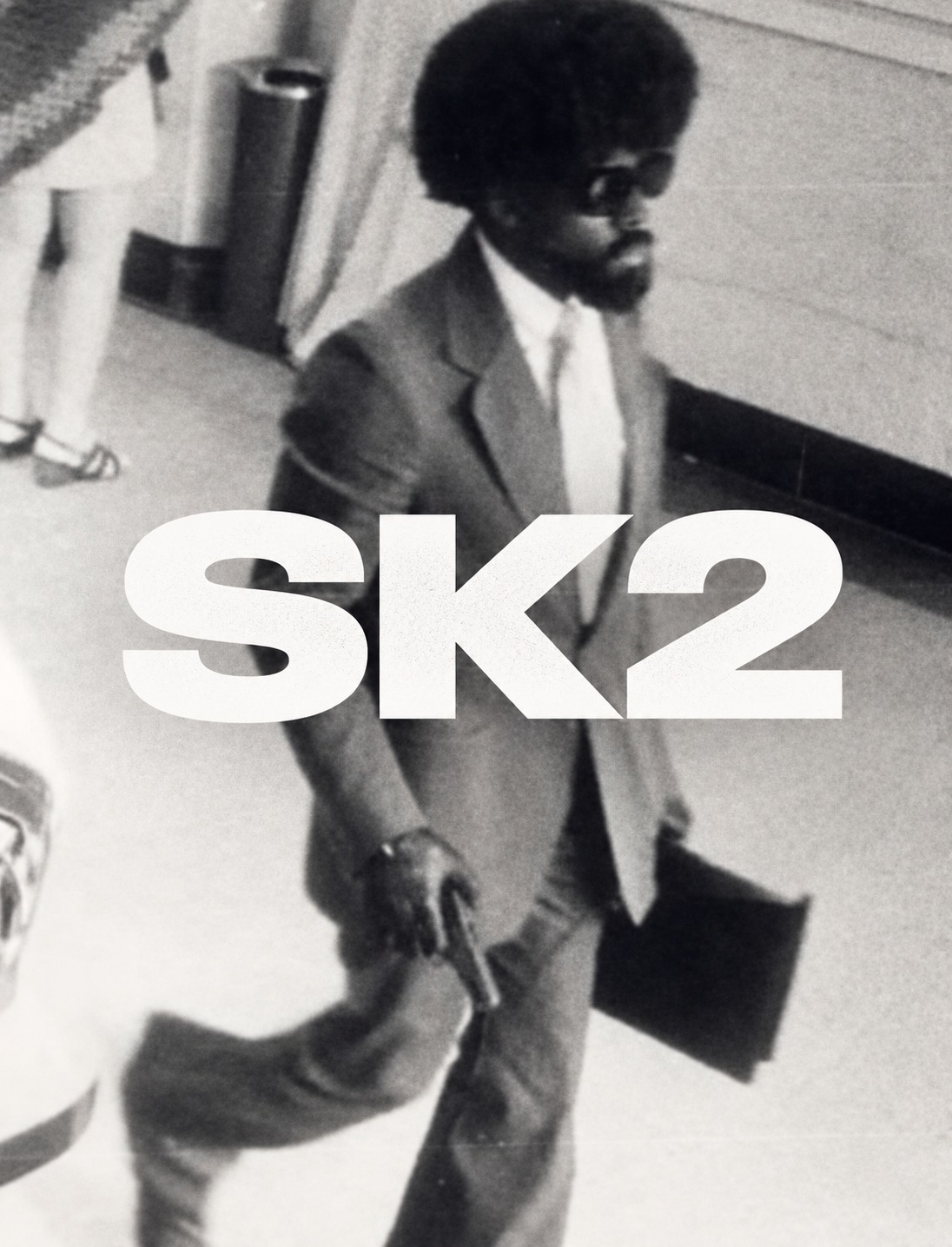 SK2 album cover: black and white street photograph with SK2 across the image